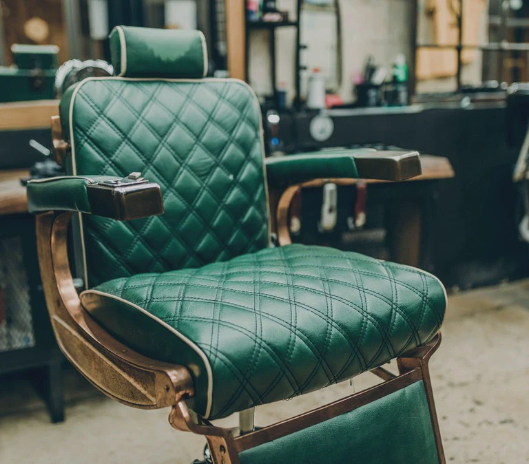 zielony fotel fryzjerski